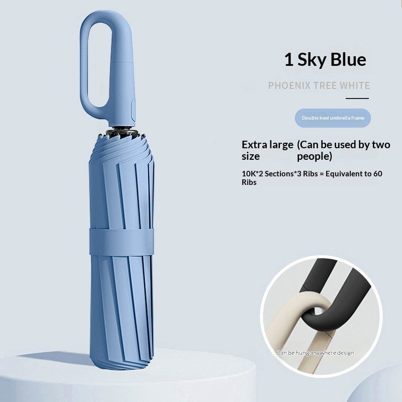 Closed folding umbrella with ring handle and close-up handle detail
