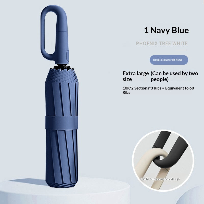 Closed folding umbrella with ring handle and close-up handle detail