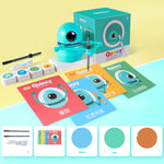 Kids’ Drawing Robot displayed with box, books, cards, cable and pens