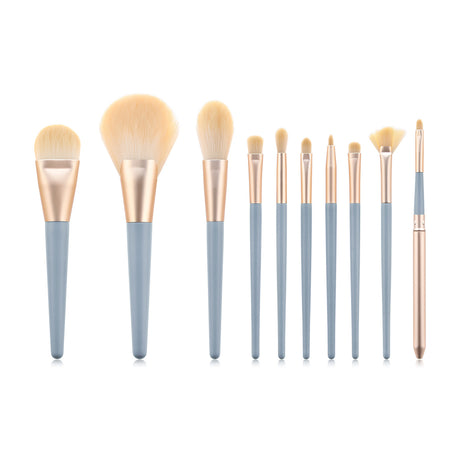 10-piece makeup brush set with blue handles and pale bristles on white background