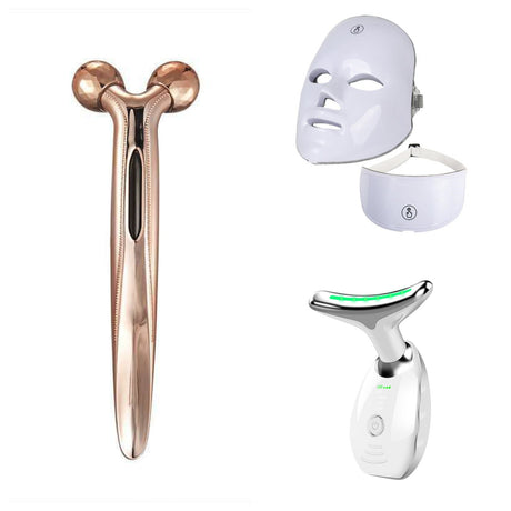 White face and neck mask with roller and handheld beauty device