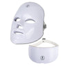 White face mask and matching neck device with visible straps on white background