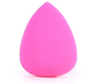Bright pink teardrop Makeup Sponge Puff on a white background