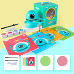 Kids’ Drawing Robot displayed with green box, books, cards, cable and pens