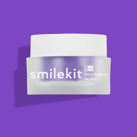 Closed frosted Smilekit Colour Corrector Powder jar on purple background