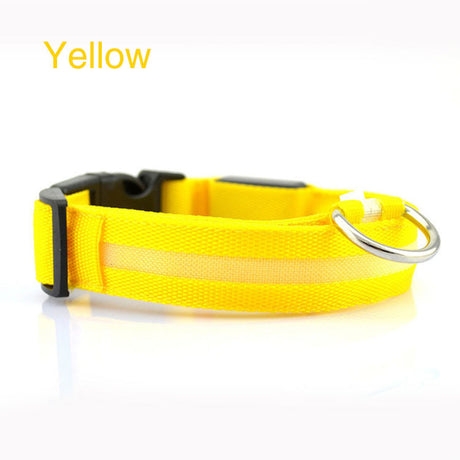 Yellow LED dog collar side view with black buckle and metal ring