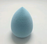 Blue teardrop Makeup Sponge Puff on a pale background