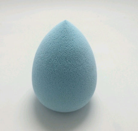 Blue teardrop Makeup Sponge Puff on a pale background