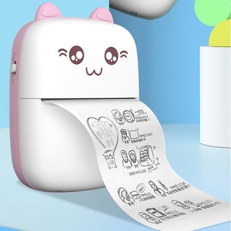 Pink mini printer printing a sheet with small illustrations
