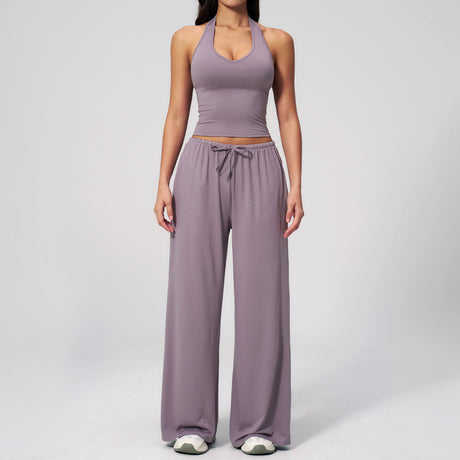 Women's mauve halter crop top and matching drawstring wide leg trousers, front view.