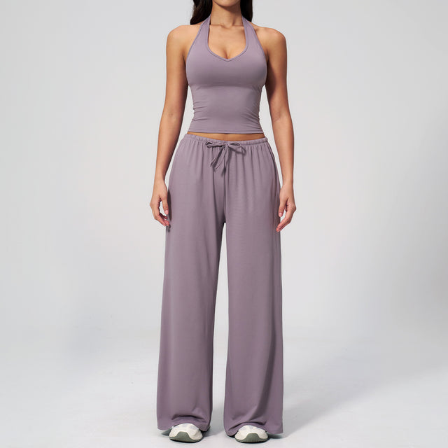 Women's mauve halter crop top and matching drawstring wide leg trousers, front view.