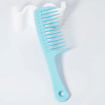 Peine de dientes anchos