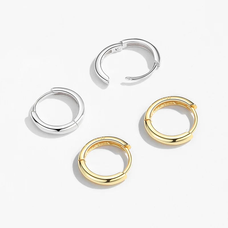 Boucles d’oreilles créoles argentées