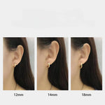 Boucles d’oreilles créoles argentées