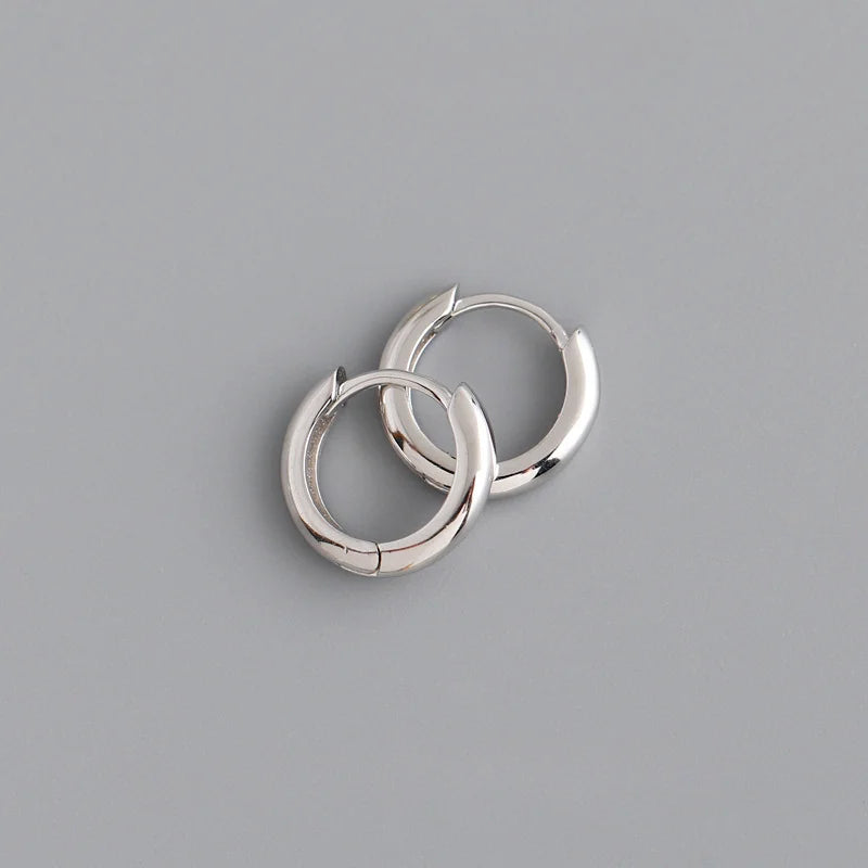 Boucles d’oreilles créoles argentées