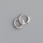 Boucles d’oreilles créoles argentées