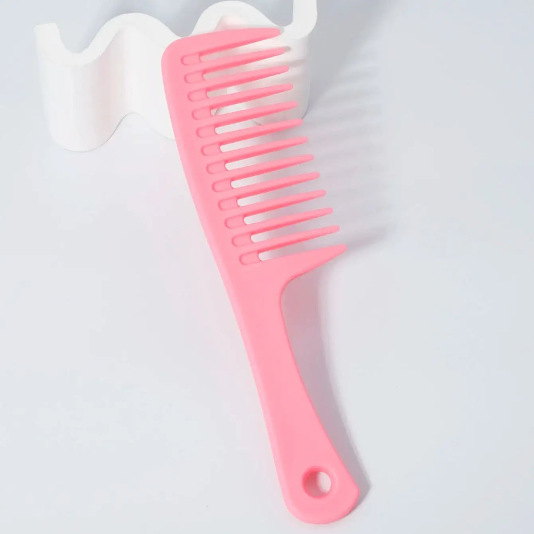 Peine de dientes anchos
