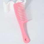 Peine de dientes anchos
