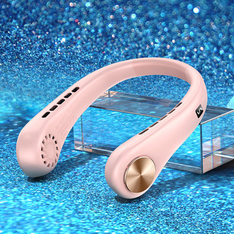 Pink rechargeable neck fan with gold side button on blue glitter surface