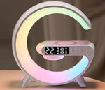White G-shaped LED lamp glowing pastel colours, with clock display and buttons