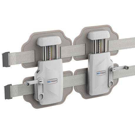 Hand-Operated Lumbar Traction Device laid flat, angled view with twin panels and straps