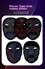 Five LED face masks with red, blue and white opera-style patterns