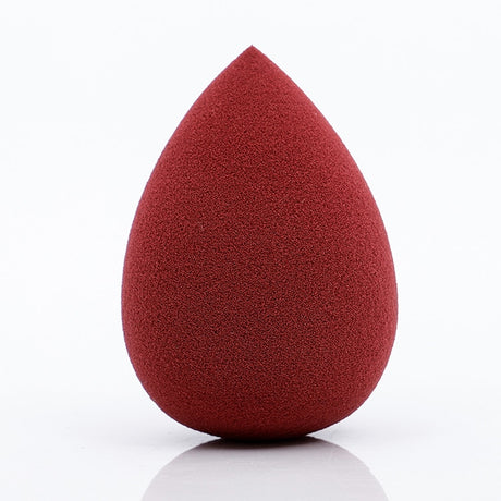 Dark red teardrop Makeup Sponge Puff on a white background