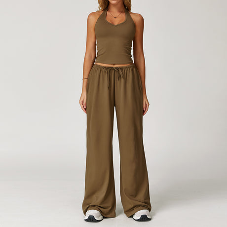 Women's brown halter crop top and matching wide leg trousers, front view.