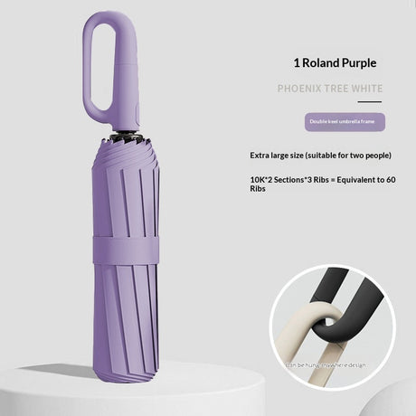 Closed folding umbrella with elongated ring handle and inset detail