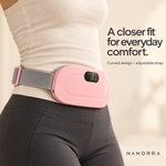 Side view of the pink NAMORRA waist belt fitted over clothing at the waist.