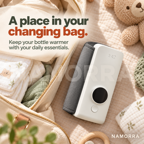 Bottle warmer packed alongside changing bag essentials