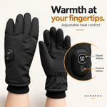 Close-up of digital display and control button on black heated glove