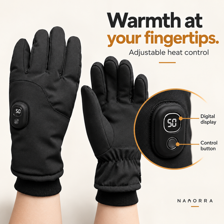 Close-up of digital display and control button on black heated glove