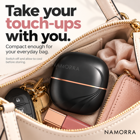 Capped black mini straightening comb in an everyday handbag
