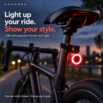 NAMORRA circular USB rear light mounted on a bicycle at dusk