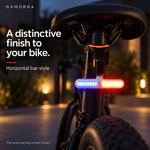 Horizontal bar bicycle rear light mounted beneath a saddle