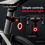 Orange control button and ring light details on NAMORRA bicycle taillight