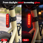 Day and dusk views of slim red tail light mounted to bicycle
