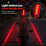 Slim bicycle rear light and two red projected lines on the ground